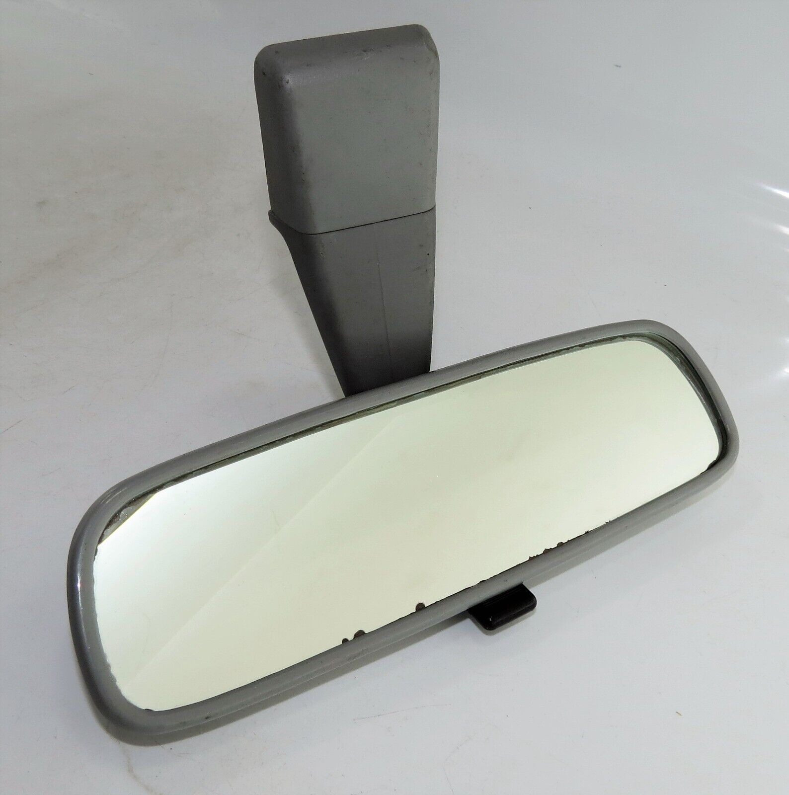 Genuine Toyota Corolla E11 (95-00) Rear View Mirror IKI 8029 Grey (E2) 00469 / C Main Image Genuine Toyota Corolla E11 (95-00) Rear View Mirror IKI 8029 Grey (E2) 00469 / C - Image 1
